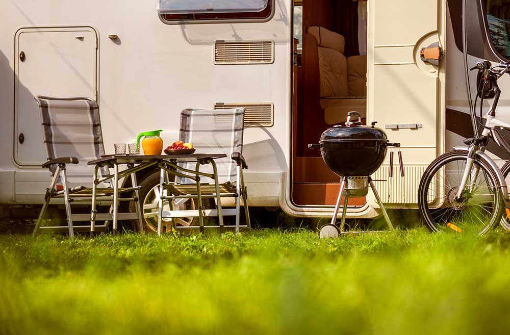 Recreation Vehicle key on top of insurance paperwork after thorough RV inspection services were preformed